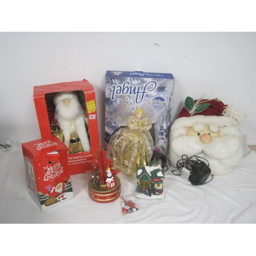 248 - An assortment of animated Xmas figures and scenes, some boxed and apparently new old stock