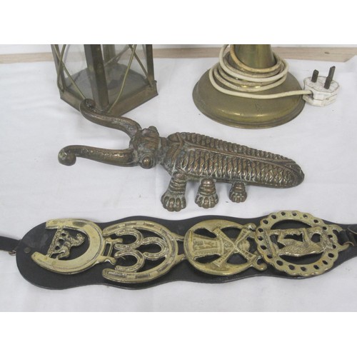 234 - A brass oil lamp converted to electricity (a/f) with a glass chimey, a brass beetle boot jack, a dec... 