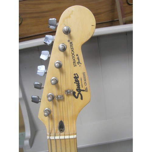 214 - One Squier Stratocaster by Fender (made in Korea) Electric Guitar plus Amplifier