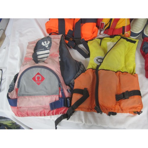 309 - Selection Of Buoyancy Aids. One Gull Wet Suit. One Double Eye Fender. One Pair Of Rubber Plastimo Bo... 