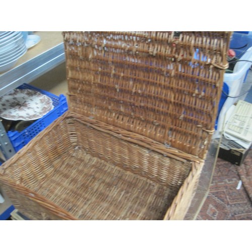 325 - A pair of woven top footstools plus a number of rectangular wicker baskets