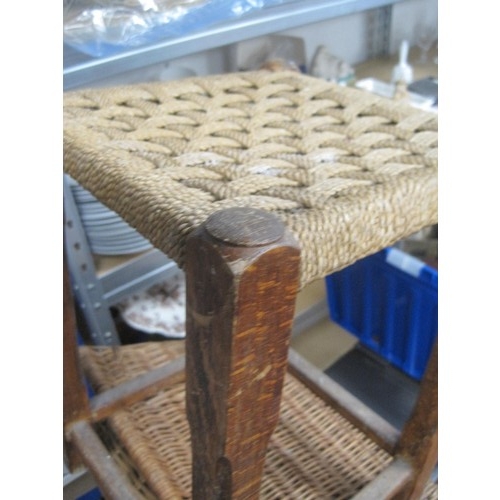 325 - A pair of woven top footstools plus a number of rectangular wicker baskets