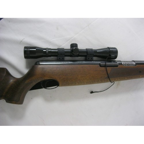 25 - An Air Arms TX200 .22 calibre air rifle, right hand breech, underlever cocking, fitted with sling an... 