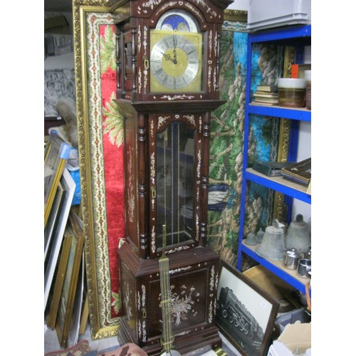 40 - An imposing modern grandfather clock, the case inlaid with mother-of-pearl in Oriental designs, in f... 