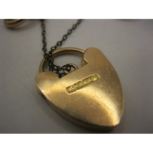 44 - A 9 carat gold hollow-link bracelet with heart-shape clasp and a base metal safety chain. The clasp ... 