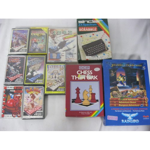 22 - A Sinclair ZX Spectrum 48k computer with cassette player, joystick and 23 games on cassette