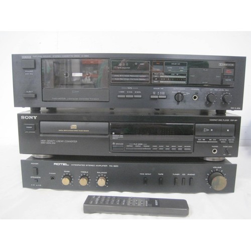 34 - One Yamaha K220 Cassette Deck
Rotel RA820 Stereo Amplifier
Sony CDP 397 Compact Disc Player