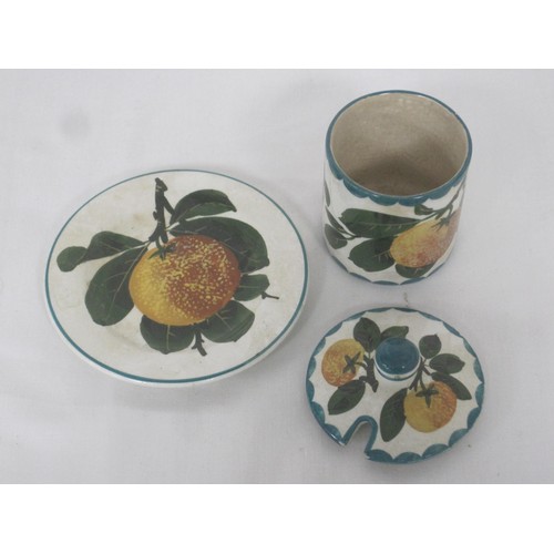 131 - A Wemyss pottery preserve jar and lid on matching stand, oranges pattern