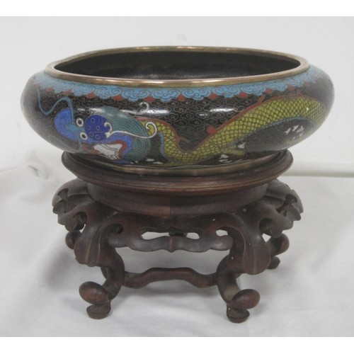 124 - A Chinese cloisonne bowl with dragon decoration on ornate intricate stand