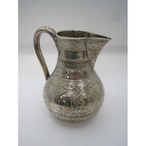 125 - A Victorian silver sparrow beak jug with ornate engraved decoration, hallmarked for London 1878, app... 