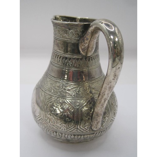 125 - A Victorian silver sparrow beak jug with ornate engraved decoration, hallmarked for London 1878, app... 