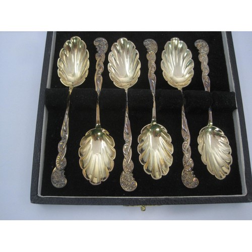 62 - Cased set of six Silver Gilt Teaspoons with shell shaped bowls and ornate handles London 1893 73gm