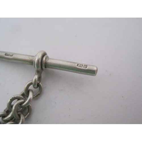 63 - An ornate Silver Albertina Watch Chain with tassel