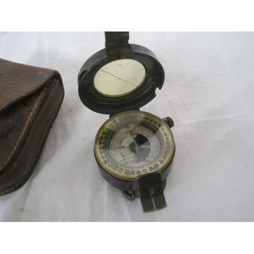 375 - A WW1 Steward Prismatic Compass in its leather case. The compass is marked: J.H.STEWARD. LONDON. THE... 