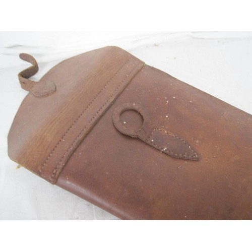 385 - A cut down brown leather Rifle case 60cms long.