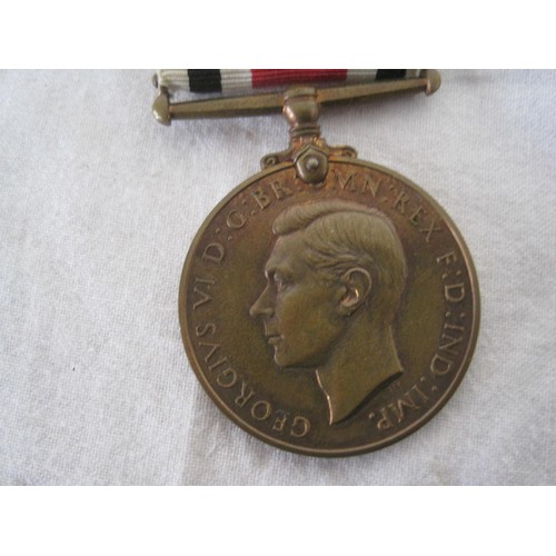 386 - A Special Constabulary Long Service Medal with original ribbon, named to: WILLIAM CAMERON