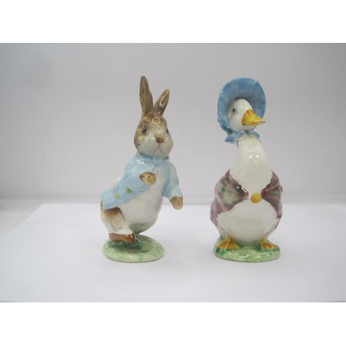 56 - Four Beswick Kitty MacBride figures, including Double Act, a Beswick Peter Rabbit and a Jemima Puddl... 