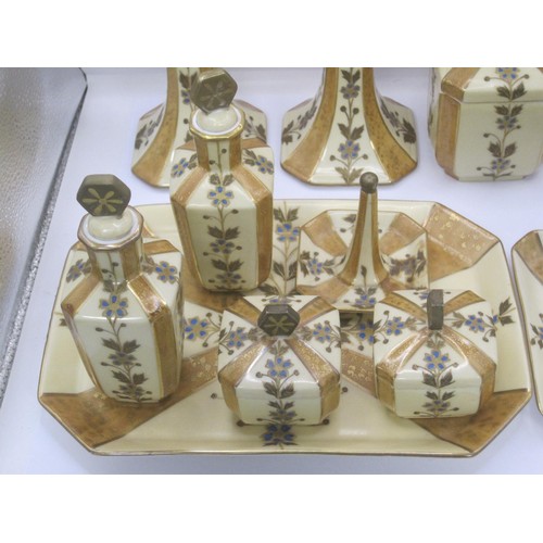 48 - A Limoges Art Deco 10pc Dressing Table Set, comprising tray, candlesticks, x2 scent bottles, large j... 