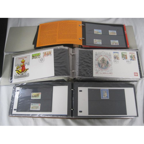 137 - 7 albums containing a large quantity of first day covers