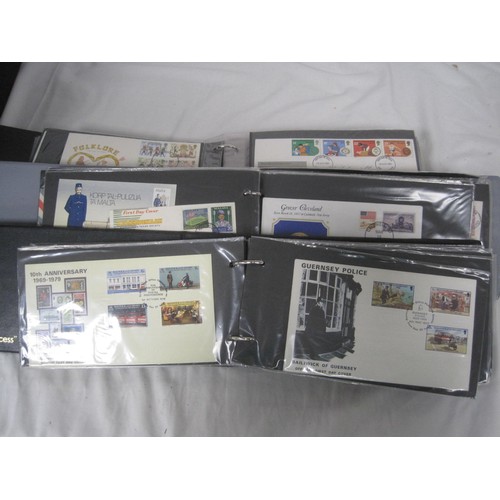 137 - 7 albums containing a large quantity of first day covers