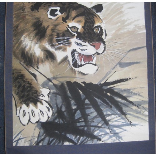 133 - A large Chinese scroll painting of a tiger