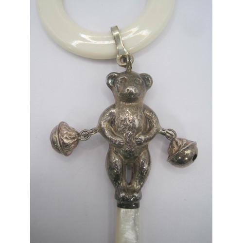 150 - A Birmingham 1986 hallmarked filled silver teddy bear shape baby's rattle with a ring chew