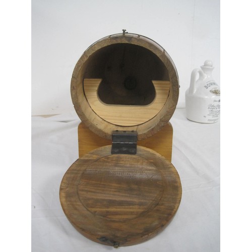 146 - A wooden Grant's Whiskey bottle holder in the form of a barrel, with stand, and a Bowmore ceramic de... 