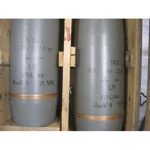 99 - A pair of crated 155mm artillery shells, originally WW2 German but repainted for the Swedish Army po... 