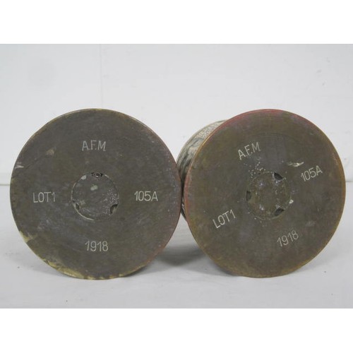 144 - A pair of 1918-dated Trench Art shell cases formed as lidded pots, one decorated with a hunting dog ... 