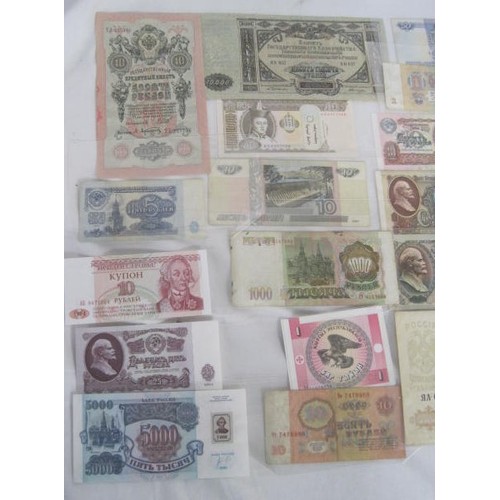 154 - A selection of 20+ Russian (and possibly other Eastern European, cyrillic using nations) banknotes i... 