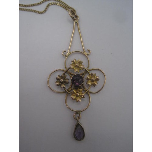 168 - A 9 carat imported gold necklace approx. 1.5g, with foliate drop pendant set with two amethysts, gro... 