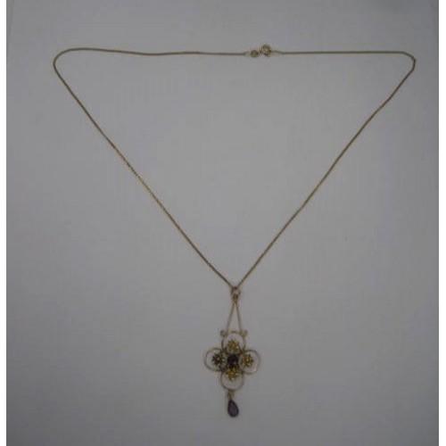 168 - A 9 carat imported gold necklace approx. 1.5g, with foliate drop pendant set with two amethysts, gro... 