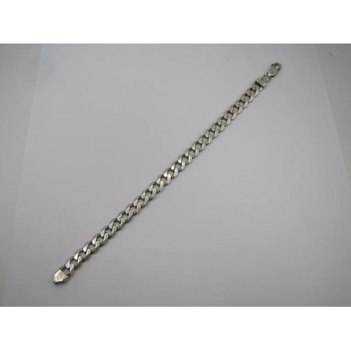 171 - A chunky silver curb link bracelet, stamped 925 Italy and import marks, length about 20cm, approx. 2... 