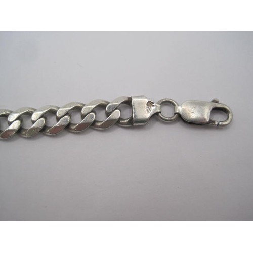 171 - A chunky silver curb link bracelet, stamped 925 Italy and import marks, length about 20cm, approx. 2... 