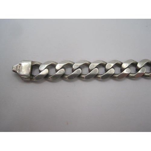 171 - A chunky silver curb link bracelet, stamped 925 Italy and import marks, length about 20cm, approx. 2... 