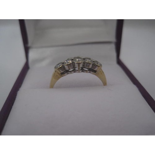 176 - A 9 carat gold five-stone cubic zirconia ring, size M/N, gross weight approx. 1.5g, stamped 375 CZ e... 