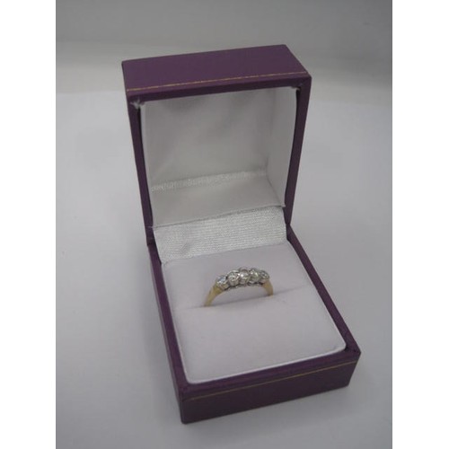 176 - A 9 carat gold five-stone cubic zirconia ring, size M/N, gross weight approx. 1.5g, stamped 375 CZ e... 