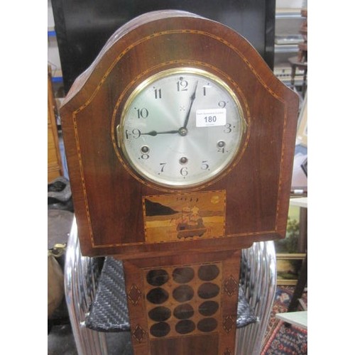 180 - An inlaid mahogany granddaughter clock, the striking movement with the crossed arrow mark of Hamburg... 