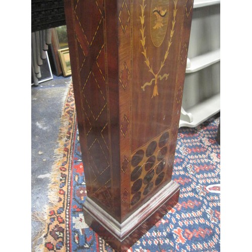 180 - An inlaid mahogany granddaughter clock, the striking movement with the crossed arrow mark of Hamburg... 