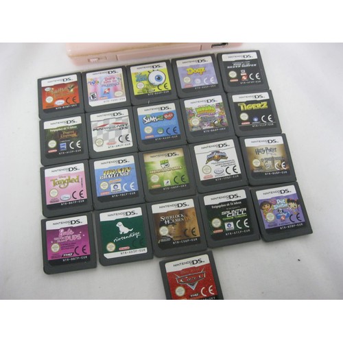 163 - A pink Nintendo DS Lite plus 21 game cartridges - unboxed - comprising Pet Shelter, Sherlock Holmes,... 