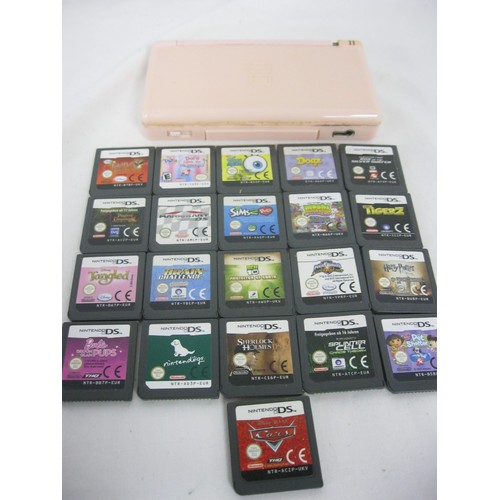 163 - A pink Nintendo DS Lite plus 21 game cartridges - unboxed - comprising Pet Shelter, Sherlock Holmes,... 