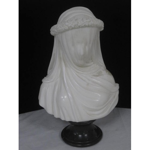 182 - A marble bust in the style of Antonio Frilli 1860-1902 of a Veiled Madonna or medieval lady .
Bust i... 