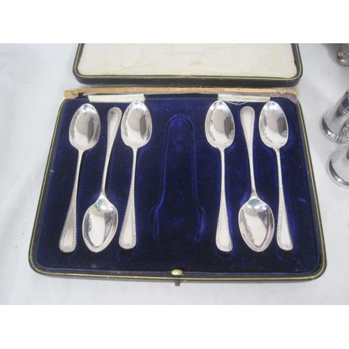 119 - Assorted electroplated ware, including cutlery, condiments, a match box sleeve, and a caddy. Some a/... 