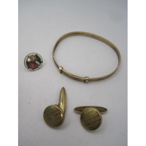 120 - Assorted rolled gold and gold-plated cufflinks and a gold-plated bracelet, contained in a black leat... 