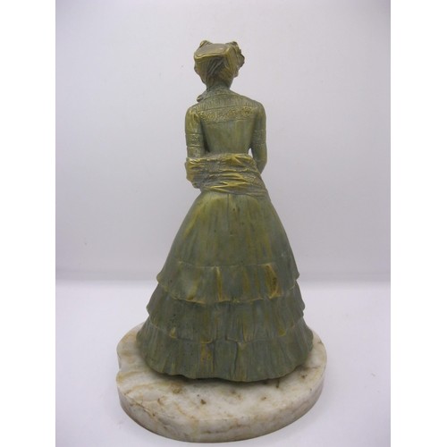 194 - A gilded bronze and carved ivory figure of a young woman on an onyx base, signed to one side Marcell... 