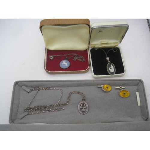 47 - Three silver necklaces each with presentation boxes, and a pair of imported silver and enamel cuffli... 