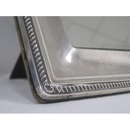 209 - A lovely silver mirror fully hallmarked for Birmingham. Size 10 inches by 12 inches. Benefit from be... 