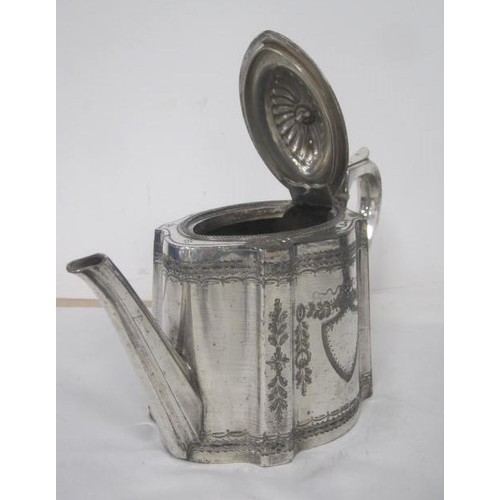 211 - A heavy silver-plated teapot with heavy engraving and a vacant cartouche .