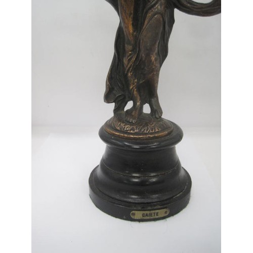 216 - A statue of French virtue by Gaiete, mounted on an ebonised metal base .Figurine approx. 12 inches t... 