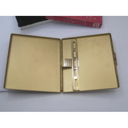 219 - A Vintage Kigu of London  Cigarette case in original box with  felt cover .